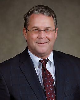 Dr. John G. Beasley